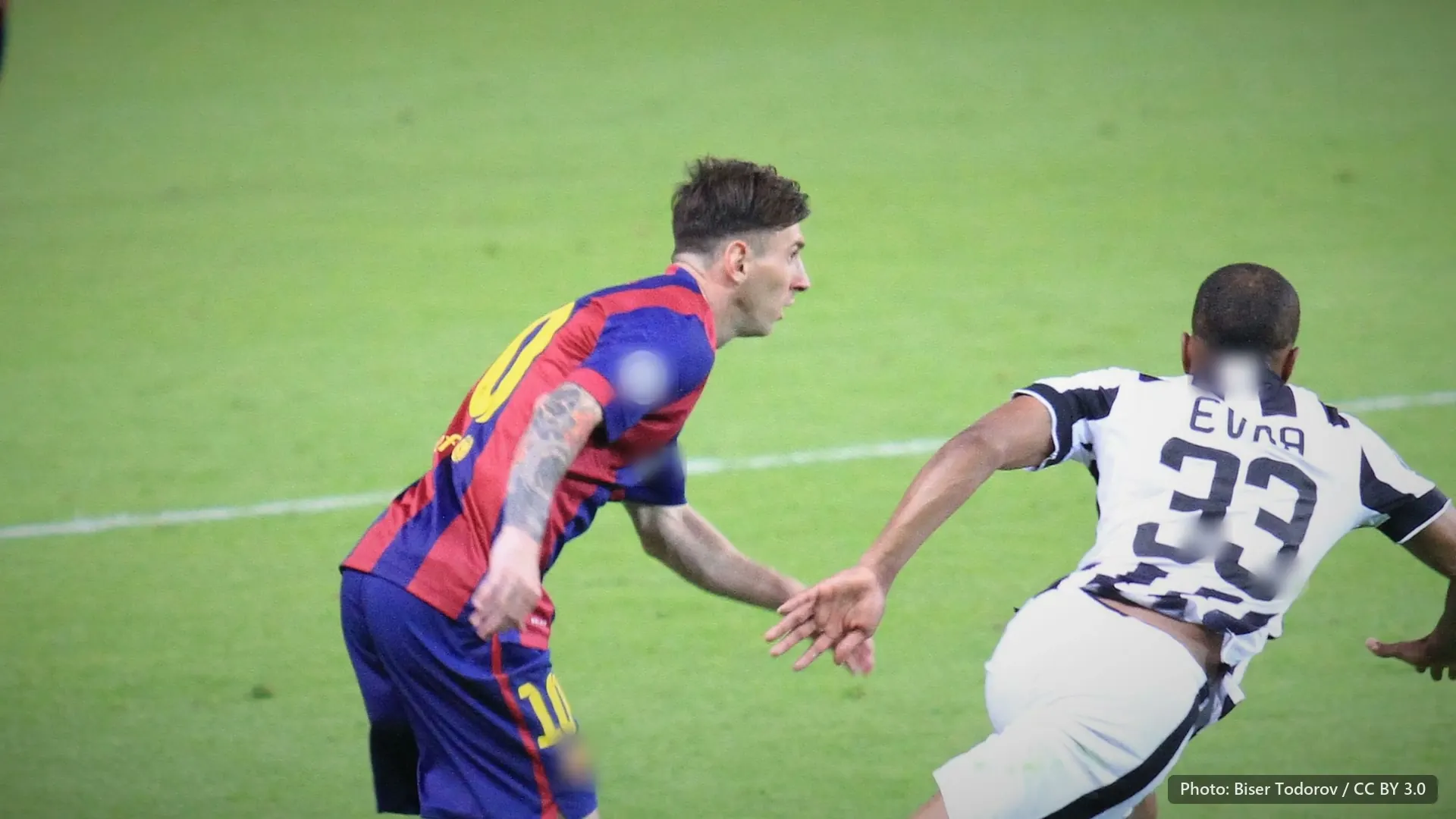 Messi in Barcelona colours chasing alongside a Juventus player, on open green. 2015 Champions League final, Berlin.